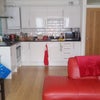 Photo 5: Kitchen and living area