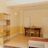 Photo 3: shared lounge/ dining room from patio garden