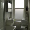 Photo 4: Stunning tiled bathroom, heated towel rail and mirror