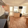 Photo 1: Kitchen