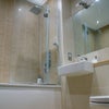 Photo 2: Bathroom Next Door