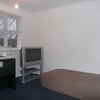 Photo 5: Double Room, desk, chair, tv, dvd