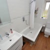 Photo 4: Bathroom (bath panels still to be completed)