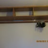 Photo 4: Ceiling wardrobe.  Great space saver.