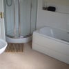 Photo 3: Bathroom with shower and bath, actually tiled now