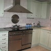Photo 2: Nice kitchen with washing machine, tumble drier, american style fridge and dishwasher.