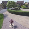 Photo 8: Driveway to house in cul-de-sac