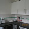 Photo 3: More of kitchen