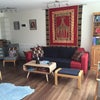 Photo 4: The living room is African themed, it's lovely! :)
