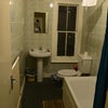 Photo 4: Bathroom includes bath and shower