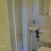 Photo 5: Shower and toilet