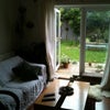 Photo 2: The living room and garden