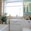 Photo 2: Bathroom with power shower.