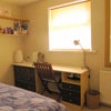 Photo 5: Bedroom with large fitted wardrobe.