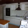 Photo 3: Fully utenciled kitchen