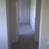 Photo 4: view from landing into a bedroom