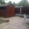 Photo 7: Lovely back garden with locking shed, patio and garden furniture