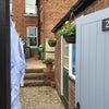 Photo 8: Tidy rear garden with parking/ access front & back 