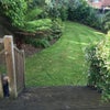 Photo 2: Garden with BBQ area 