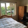 Photo 1: Bright bedroom with garden view