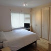 Photo 2: bedroom with fitted wardrobe
