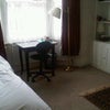 Photo 2: Bed and desk area