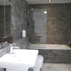 Photo 7: Large bathroom (next to bedroom 2 that bedroom 1 shares with) with luxurious boutique hotel style ba