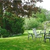 Photo 2: Garden (the room to let looks out on to this)