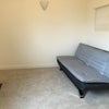 Photo 2: A lovely cute lounge with a sofa bed and a 40inch TV!! VirginMedia set top box provided