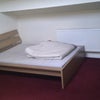 Photo 4: Bed side (TV not included)