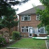 Photo 1: Back Garden. Bedroom 3 window shown.