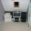 Photo 2: Private lounge  with DVD & Freeview; also has a 2 seater leather sofa and study desk