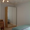 Photo 2: Wardrobe and work desk