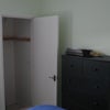Photo 3: Storage with built in hanging rail and shelves