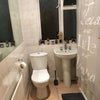 Photo 4: Bathroom.