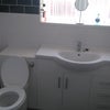 Photo 6: guest bathroom with bath & shower