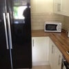 Photo 4: Kitchen with American Fridge Freezer