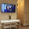 Photo 4: Flat Screen TV in the Kitchn/Lounge