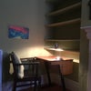 Photo 4: Desk and plenty of bookshelves.