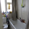 Photo 4: Full sized bathroom with shower over