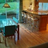 Photo 3: Open-plan Dining area with back garden view