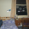 Photo 2: bedroom with bed and desk