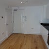 Photo 4: Kitchen area