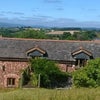 Photo 4: Barn Conversion and view from the garden