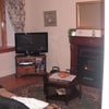 Photo 5: cosy living room with fire
