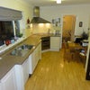 Photo 5: Kitchen with dining table etc