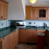 Photo 8: Kitchen - cooker end