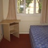 Photo 4: This room is bigger than it looks. A blank canvas for your creative decor desires
