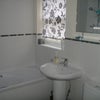 Photo 3: modern bathroom with shower in bath, also WC cloakroom downstairs