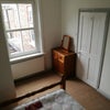 Photo 4: Built in wardrobe and free standing storage